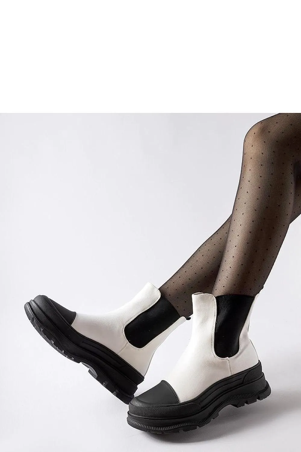 White ankle boots with a sporty Ermanno sole